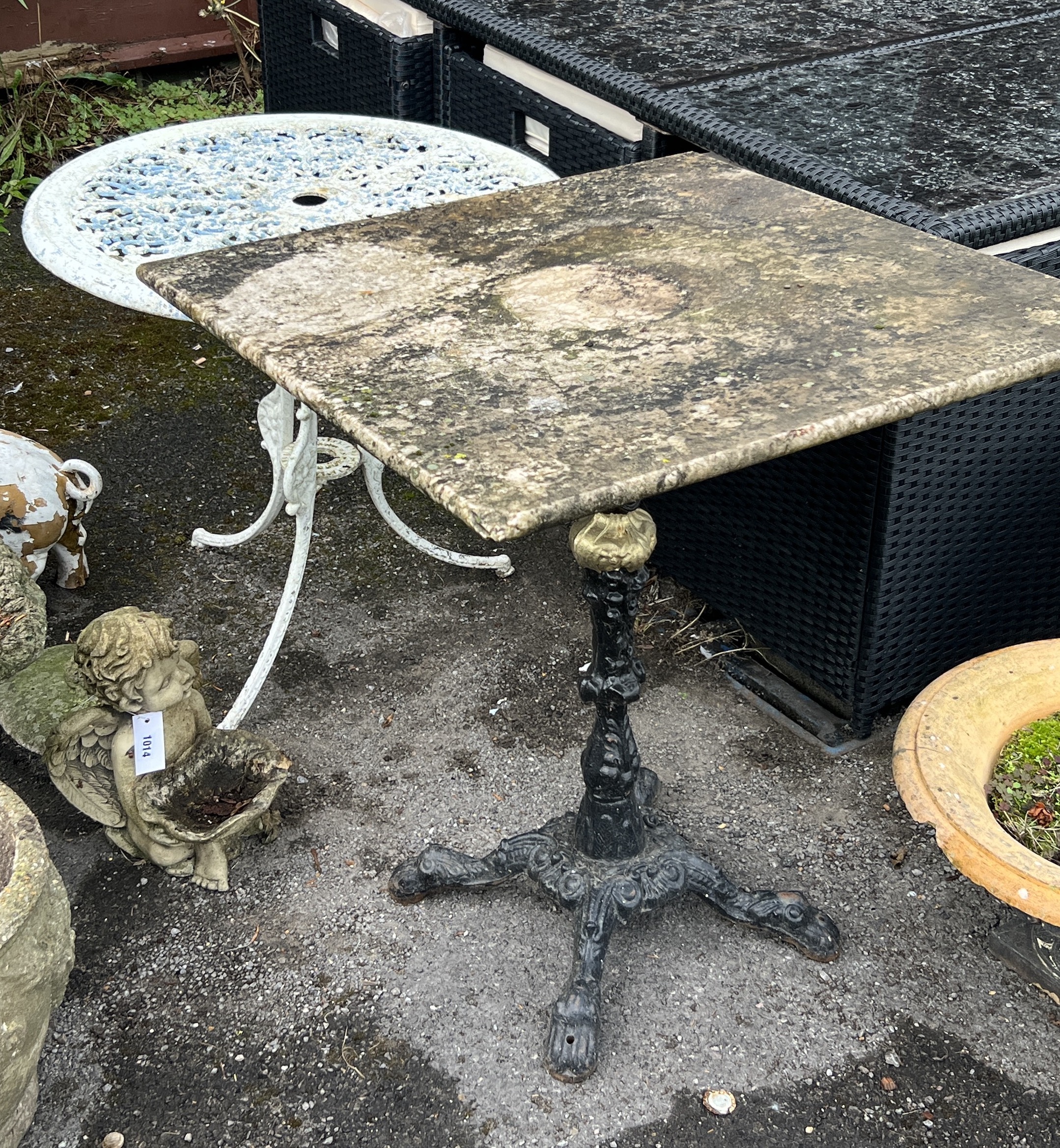 A Victorian style square marble topped cast iron garden table, width 69cm, height 73cm together with a circular aluminium garden table